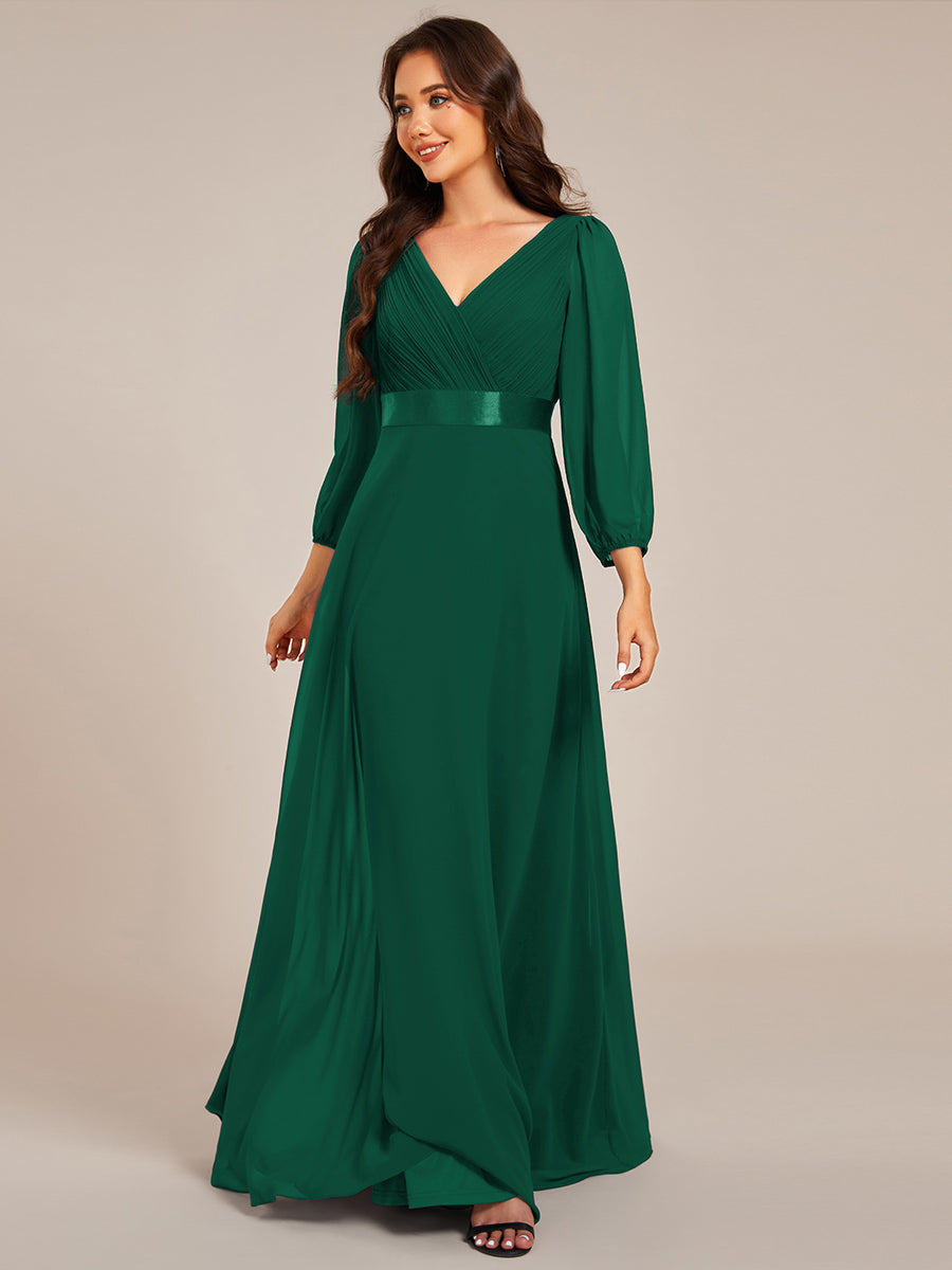 Robe de soirée trapèze taille empire en mousseline à manches longues #Couleur_Vert Fonce