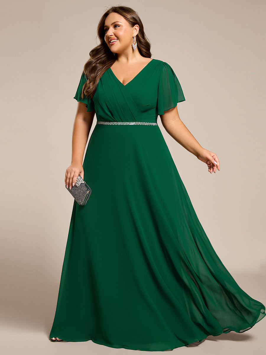 Robe de soirée plissée trapèze en mousseline de soie manches courtes et taille à sequins #Couleur_Vert Fonce