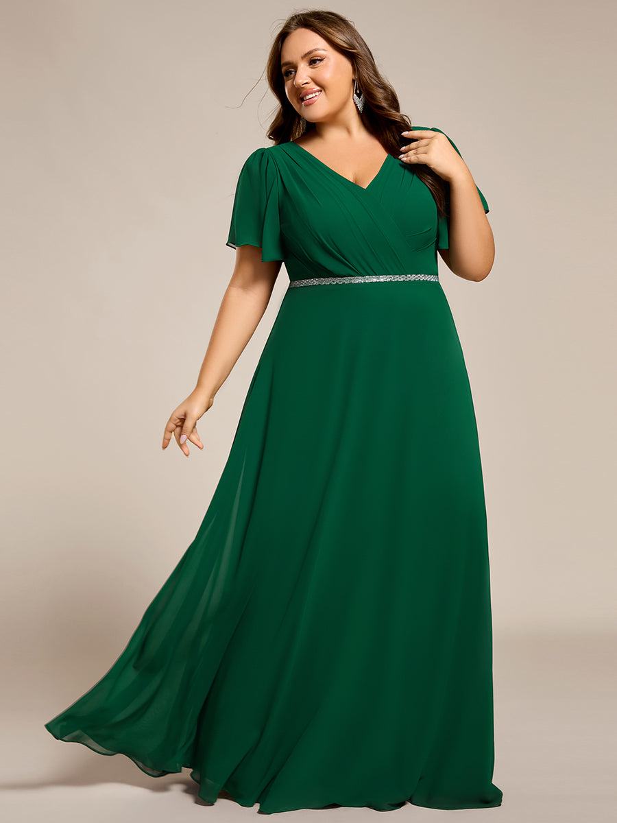 Robe de soirée plissée trapèze en mousseline de soie manches courtes et taille à sequins #Couleur_Vert Fonce