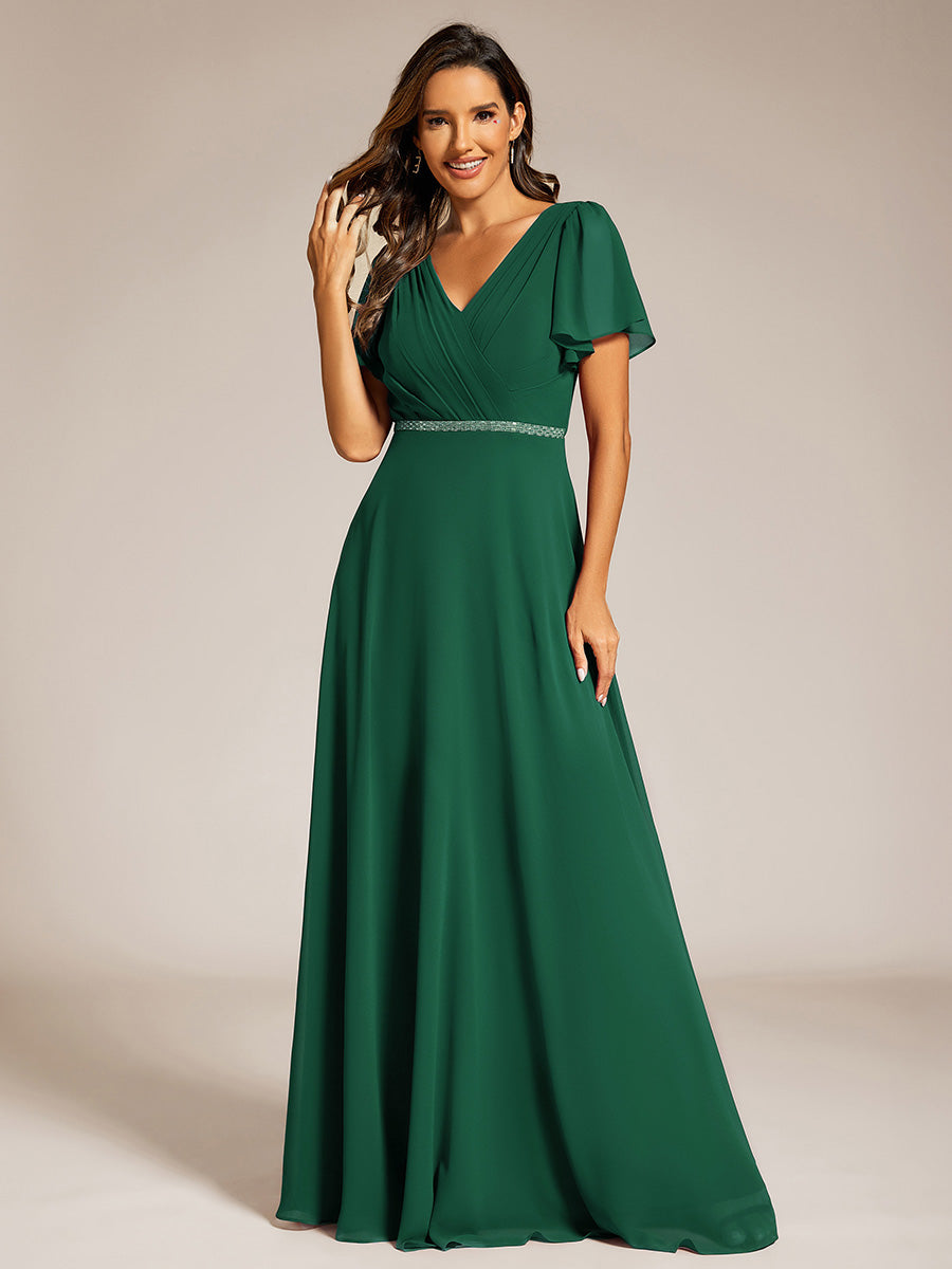 Robe de soirée plissée trapèze en mousseline de soie manches courtes et taille à sequins #Couleur_Vert Fonce