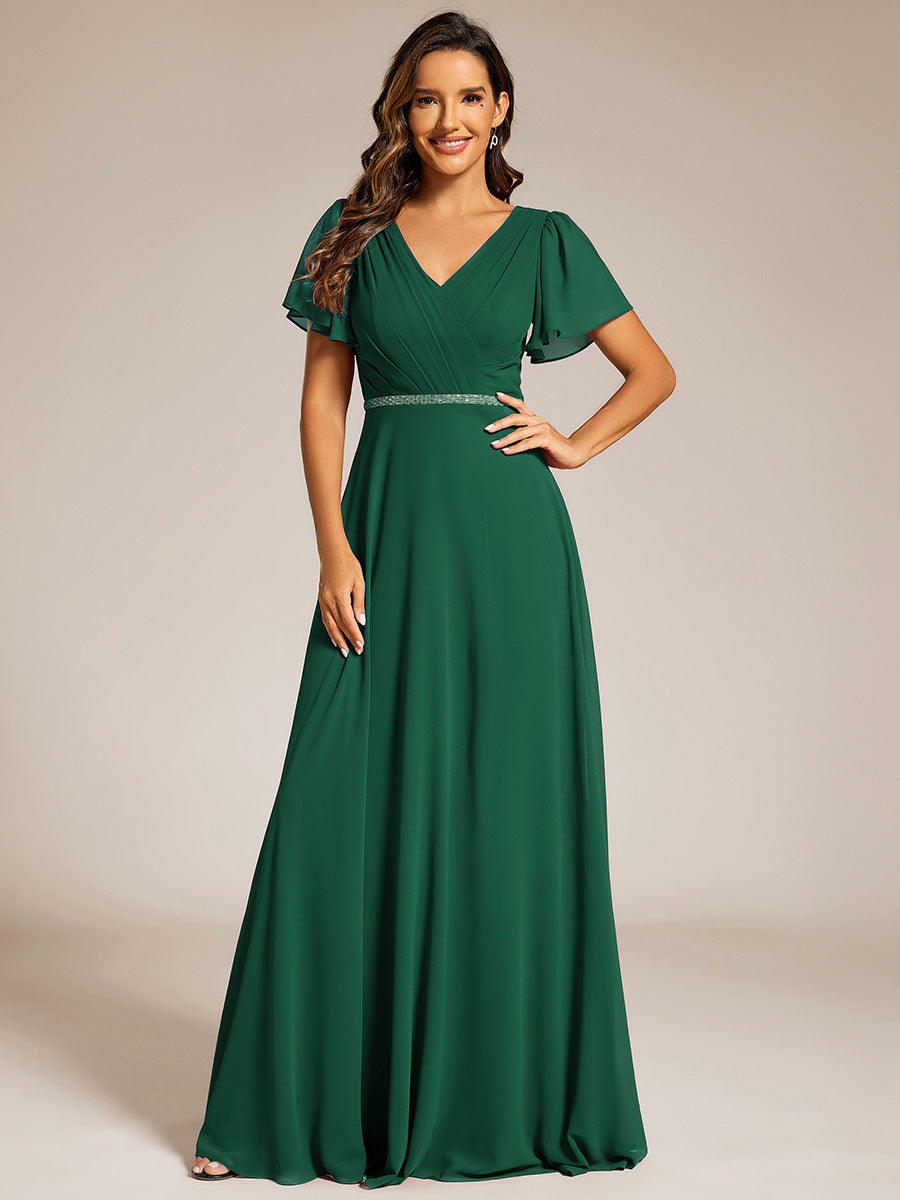 Robe de soirée plissée trapèze en mousseline de soie manches courtes et taille à sequins #Couleur_Vert Fonce