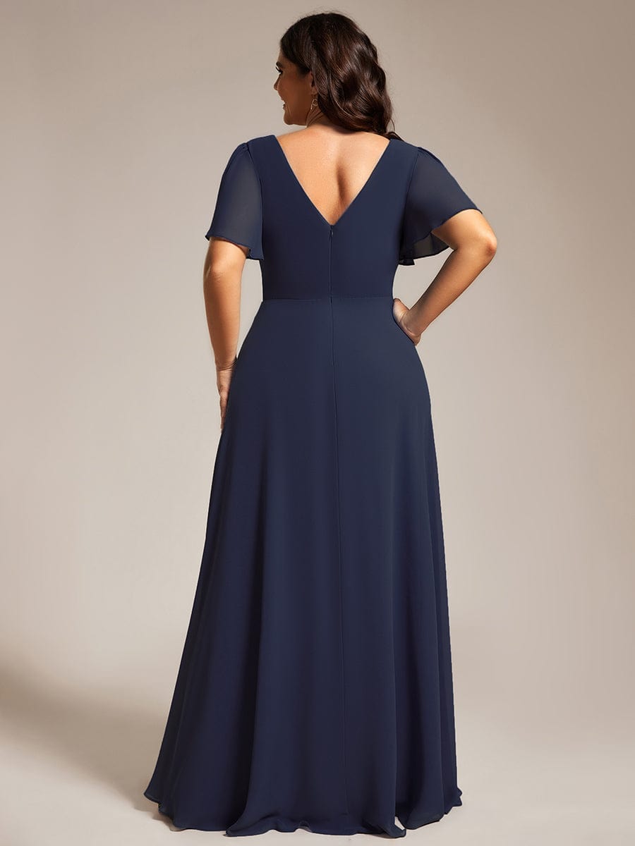 Robe de soirée plissée trapèze en mousseline de soie manches courtes et taille à sequins #Couleur_Bleu Marine