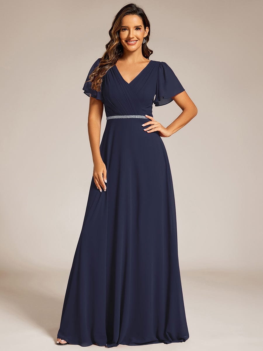 Robe de soirée plissée trapèze en mousseline de soie manches courtes et taille à sequins #Couleur_Bleu Marine