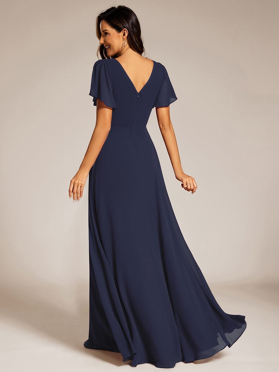 Robe de soirée plissée trapèze en mousseline de soie manches courtes et taille à sequins #Couleur_Bleu Marine