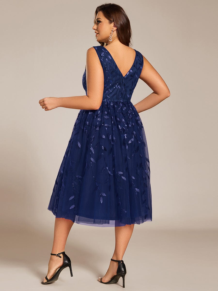 Robe d'invitée de mariage mi-longue à paillettes et feuilles grande taille #Couleur_Bleu Marine