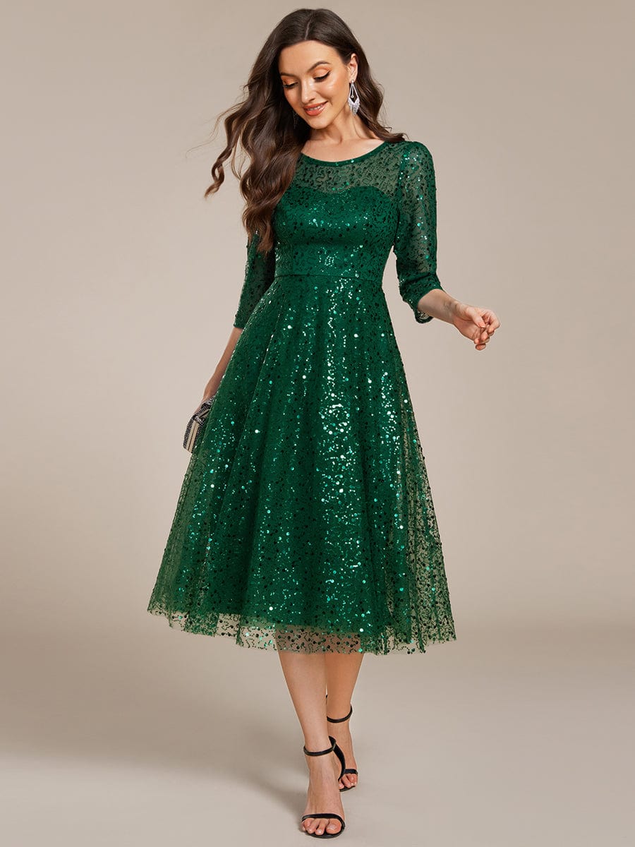 Robe d'invitée de mariage à manches 3/40 et col rond en sequins #Couleur_Vert Fonce