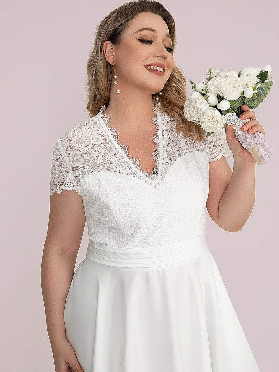 Robe de cocktail mi-longue en dentelle à manches longues et col en V de grande taille #Couleur_Blanc