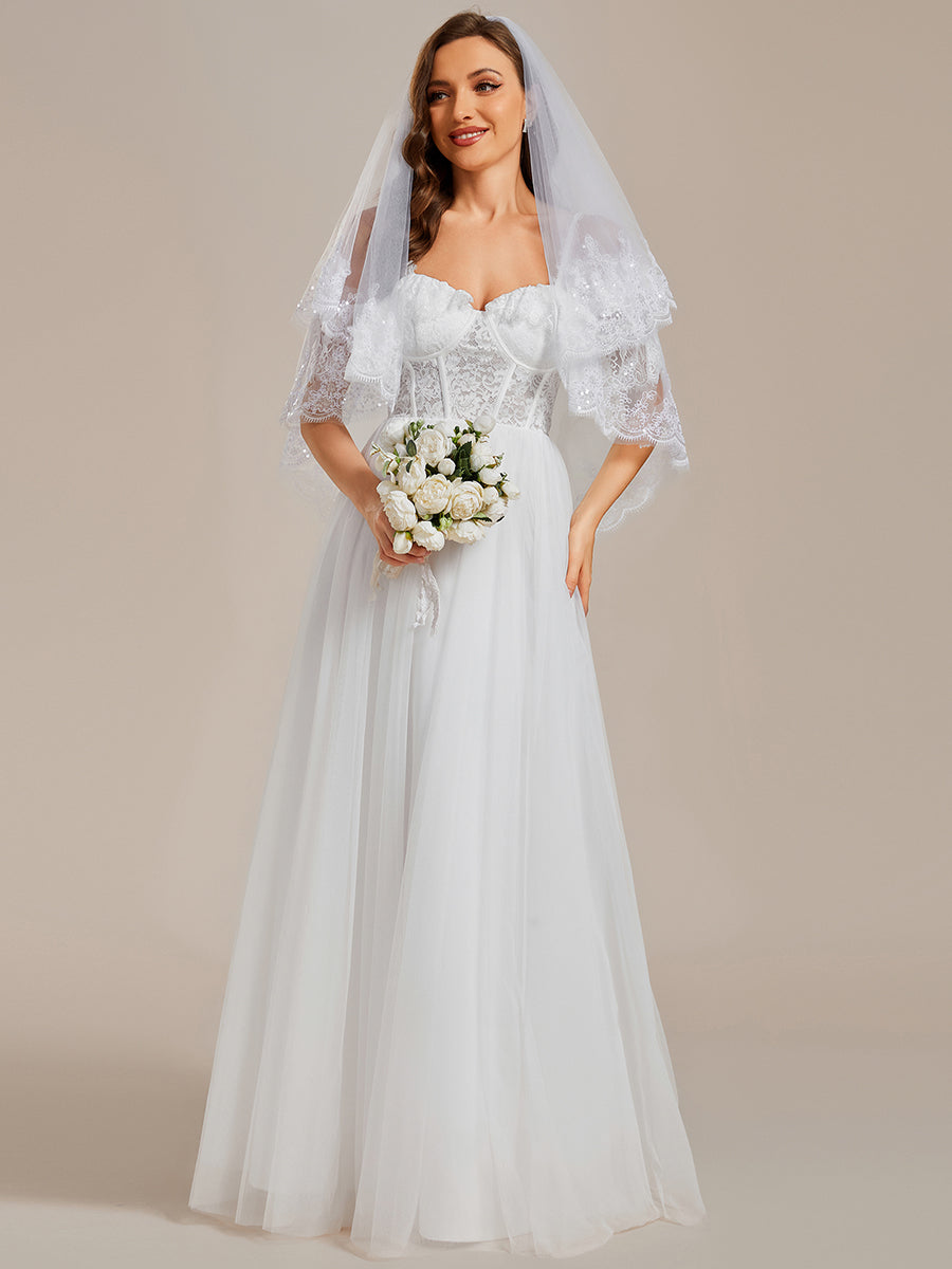Robe de mariée romantique en dentelle transparente avec corsage et bretelles spaghetti à manches courtes en tulle#Couleur_Blanc