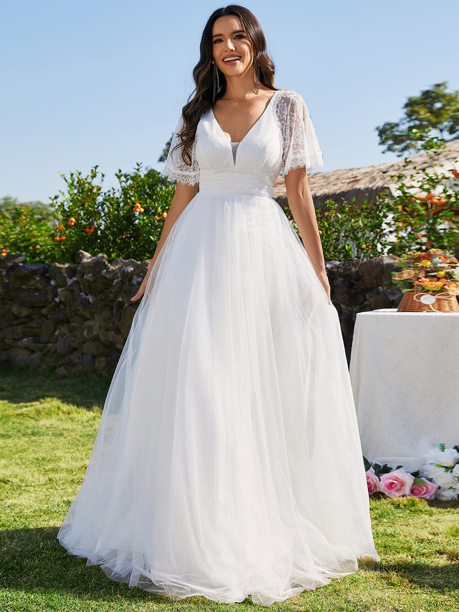 Robe de mariée en tulle avec col en V et manches plissées #color_Blanc