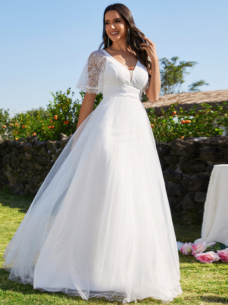 Robe de mariée en tulle avec col en V et manches plissées #color_Blanc