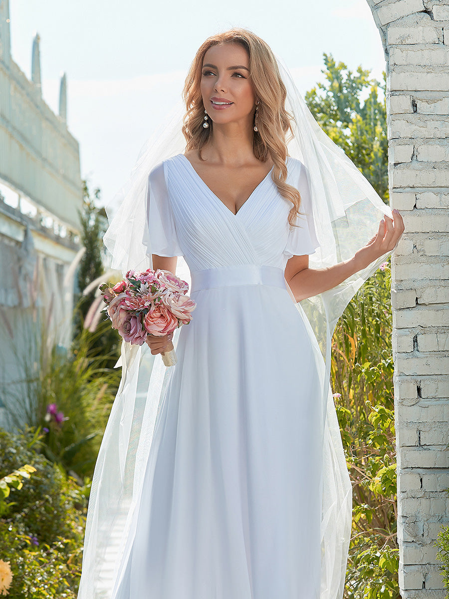 Maxi robe de mariée minimaliste en mousseline de soie avec ceinture en satin #Couleur_Blanc
